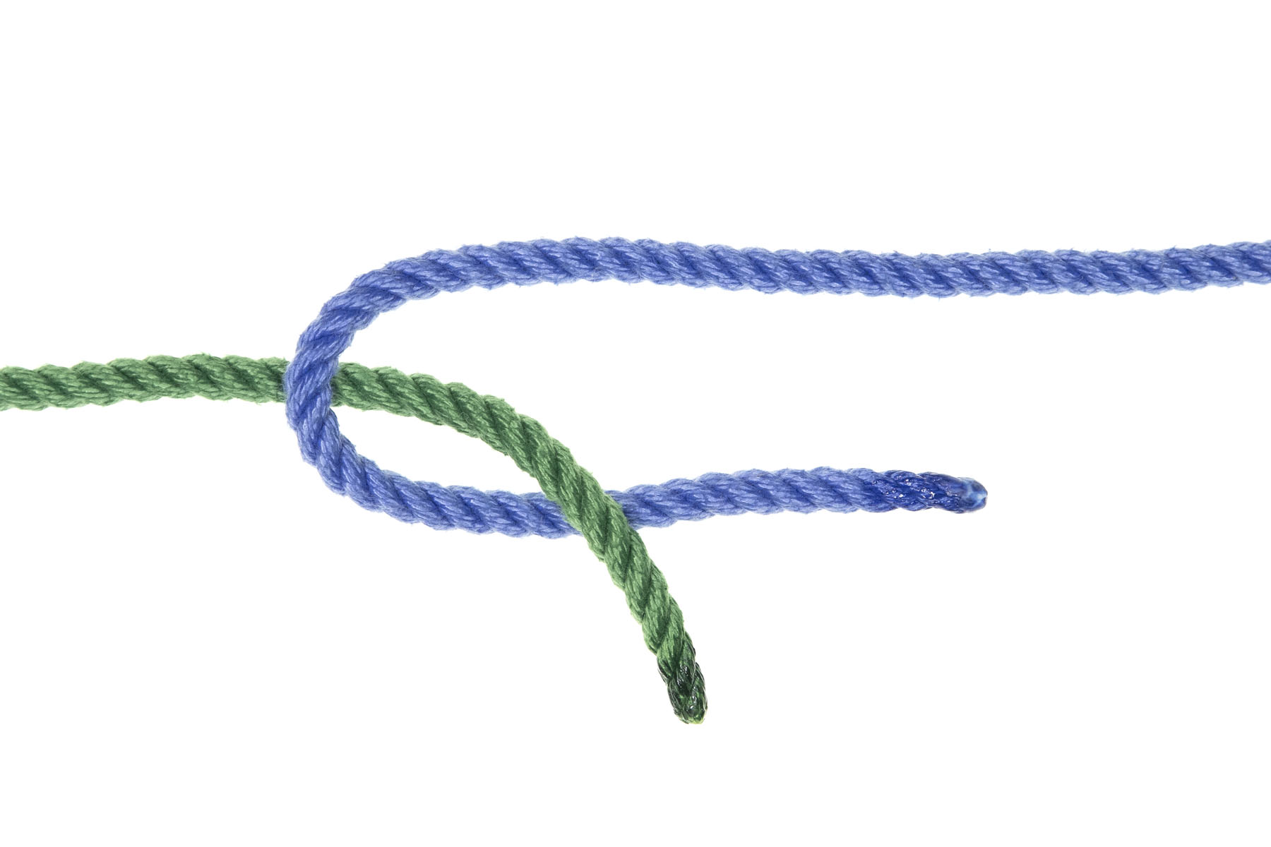 A single green rope enters from the right. It passes under the center of the turn in the blue rope, then bends down and crosses over the lower part of the blue rope.