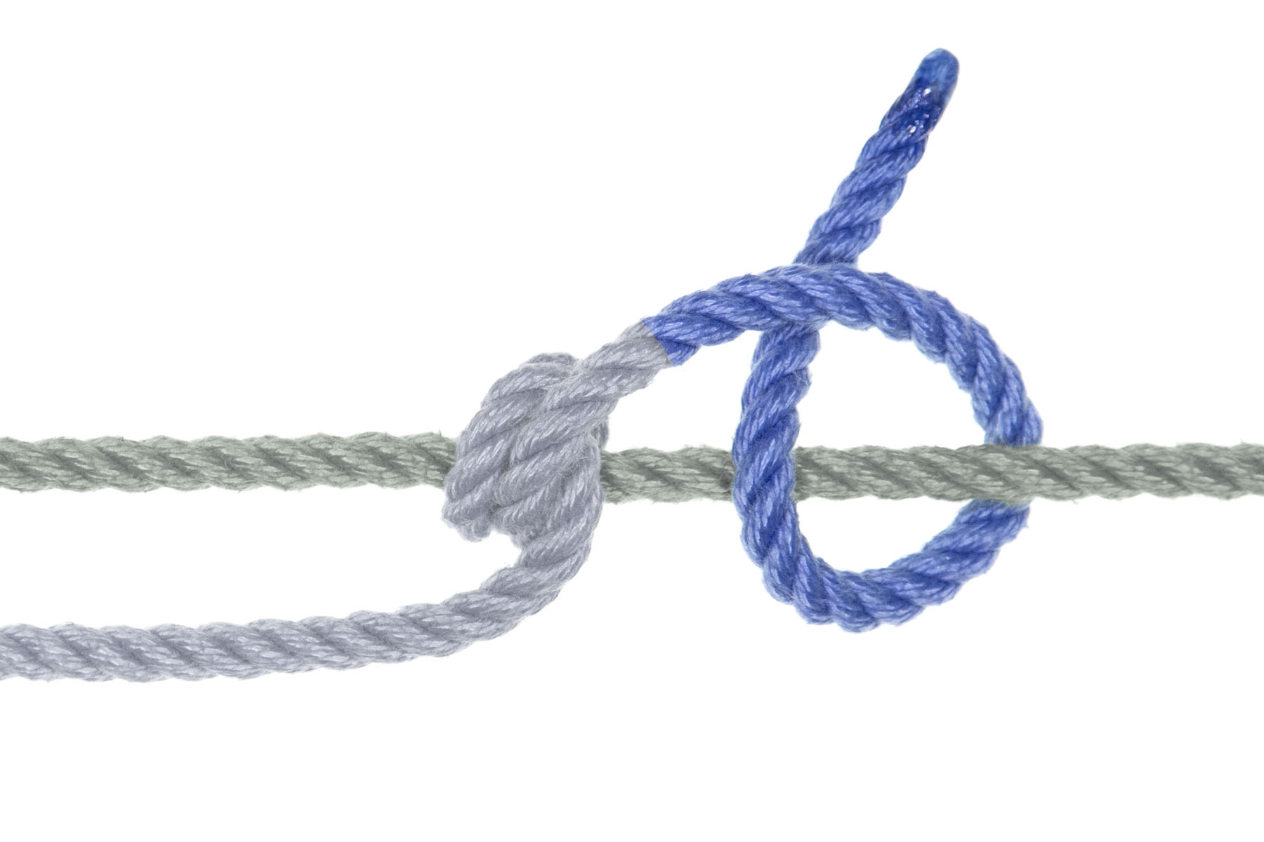 The end of the blue rope travels a few inches to the right and then crosses under the green rope, over the green rope, and under itself, making a half hitch around the green rope.