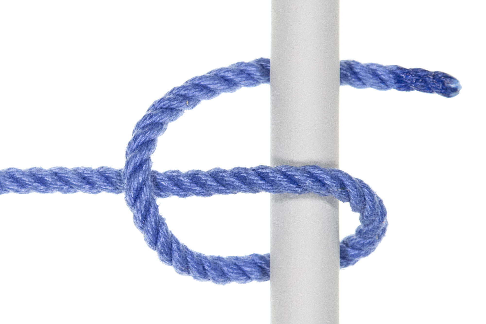 A blue rope that goes around a gray pole, over itself, and then under the pole.