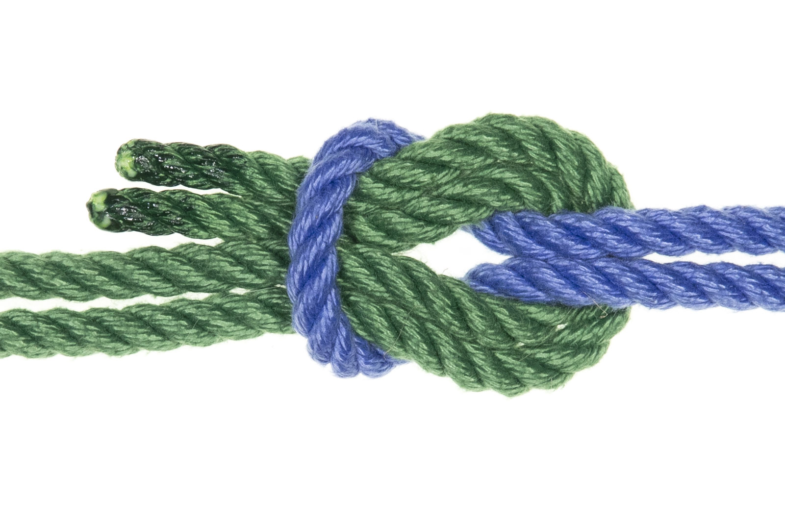 Doubled green and blue ropes threaded together to form a sheet bend knot.