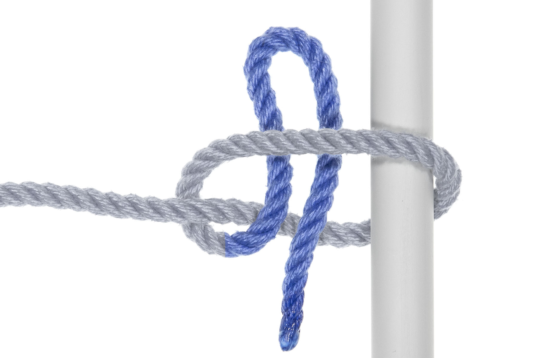 The working end has been formed into a bight, which passes into the triangle formed by the pole, the standing part, and the working end. The tip of the working end remains outside the triangle.