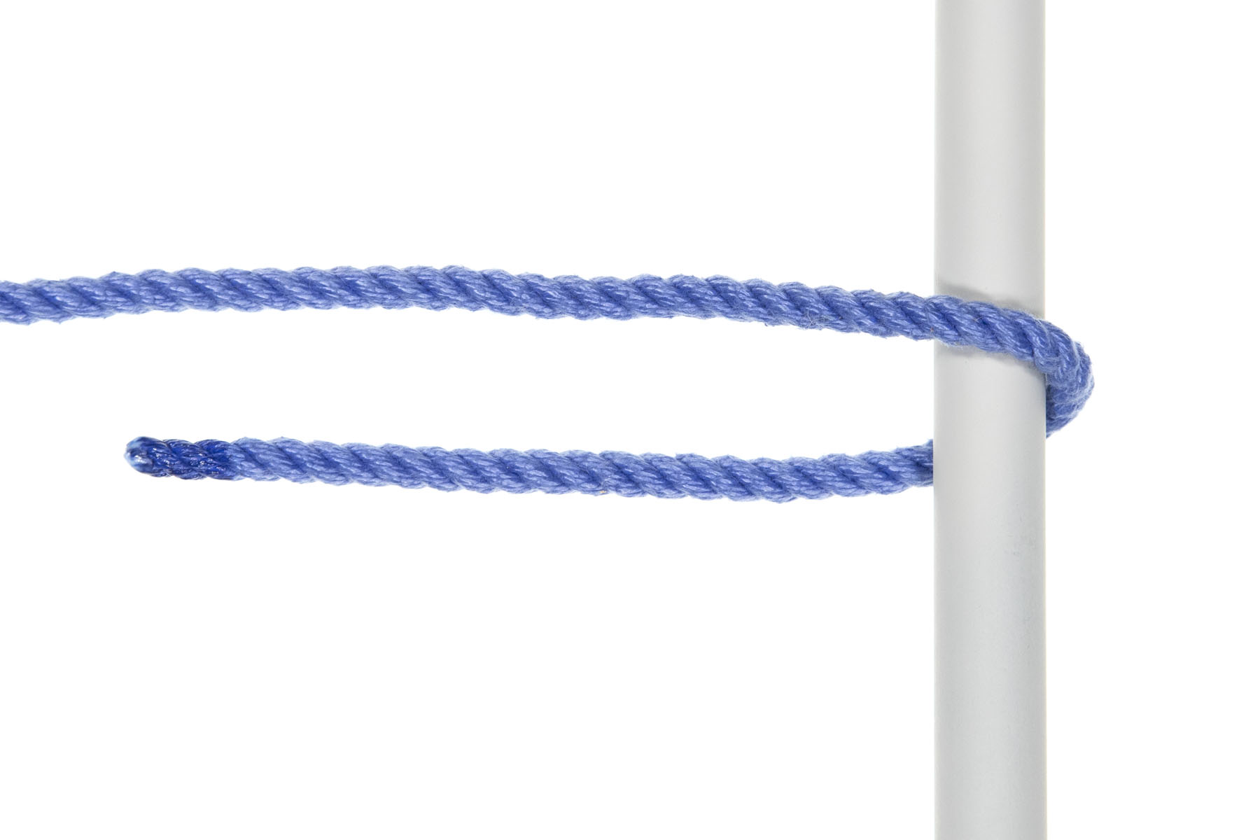 A one inch gray pole crosses the frame vertically. A blue rope enters from the left and doubles back around the pole, going over and then under it. Eight inches of the tail of the rope are pointed back toward the left, just under the standing part.