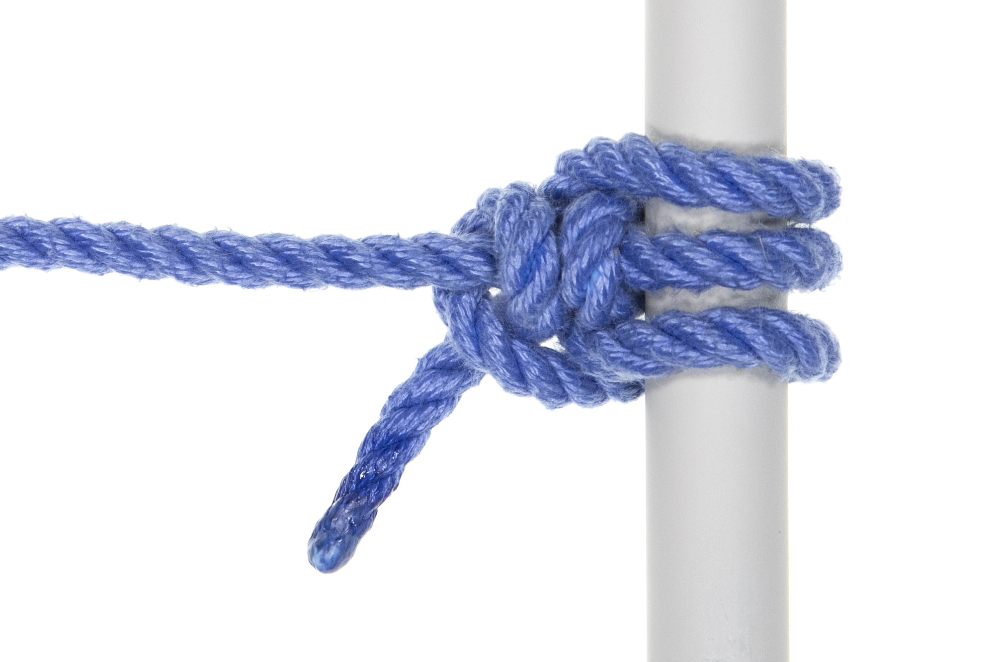 A single strand of blue rope is tied around a one inch gray vertical pole with a super Munter hitch. Three strands of rope go around the pole, and two strands go around the standing part. A two inch tail emerges from the knot.