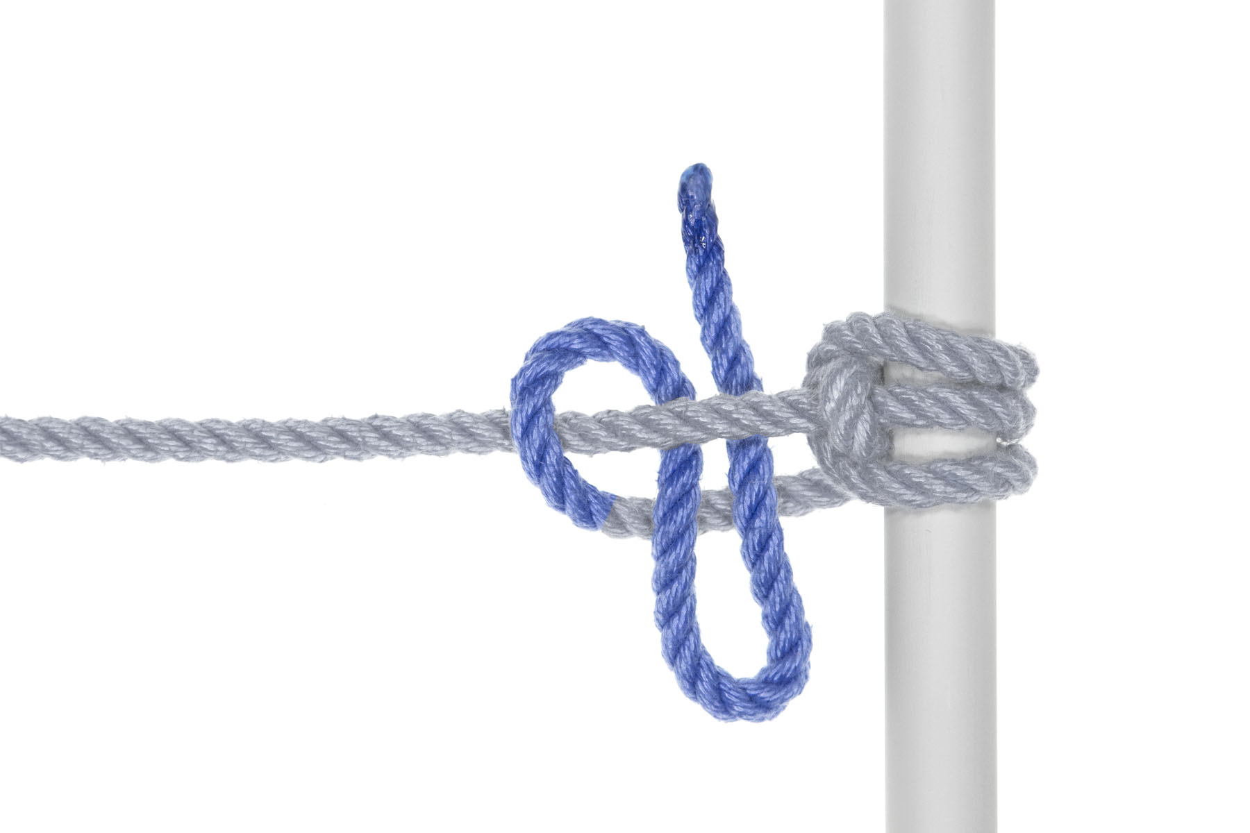 The working end makes a slipped half hitch around the standing part. It goes over the standing part and then forms a bight that goes under the standing part and over the working end.