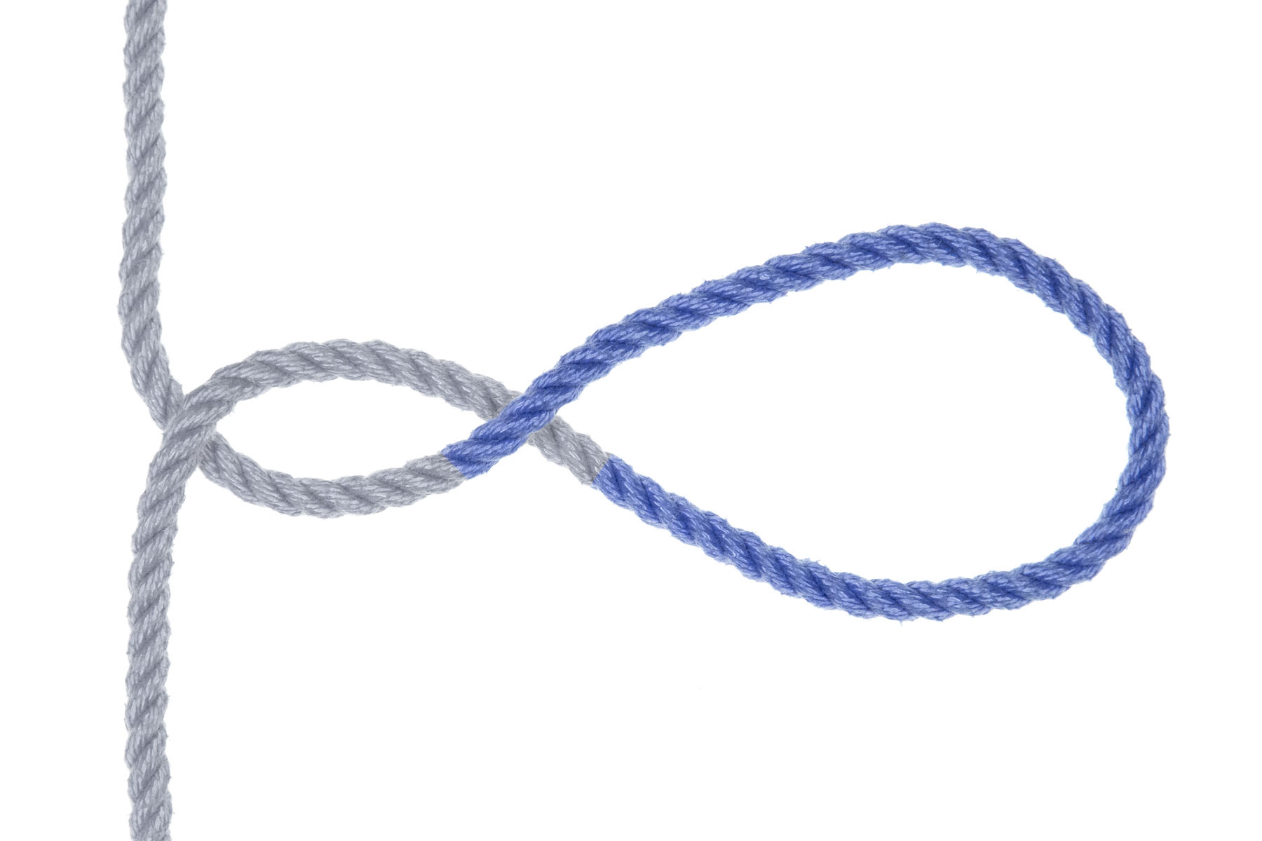 The bight has been flipped over again the the same direction, making a second twist one third of the way along the bight. As the rope enters from the top, it crosses under and then over itself before reaching the center of the bight.