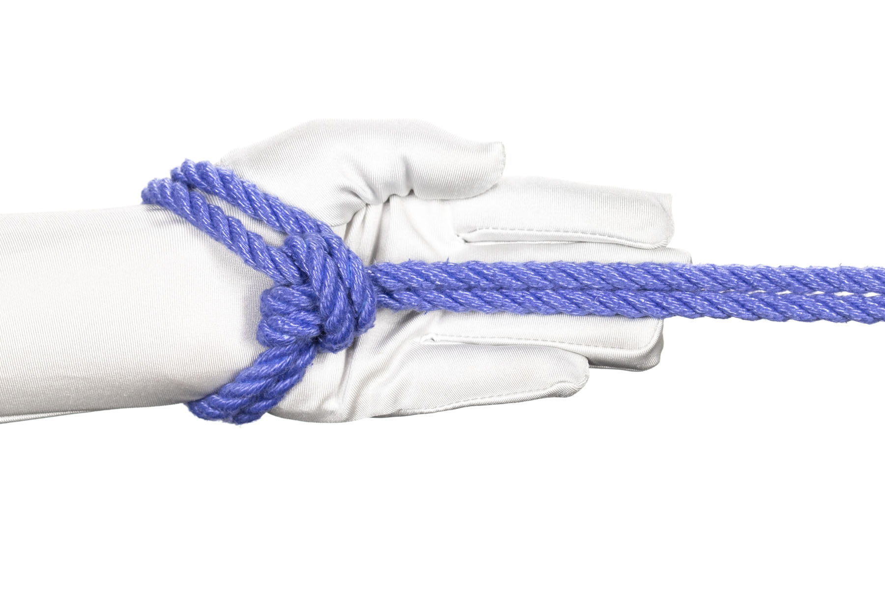 A hand pointing to the right with a single column tie with one wrap tied around it. The rope exits the half hitch facing to the right, so when the rope is pulled to the right the single column tie remains stable.